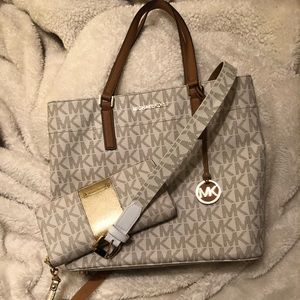 Michael Kors matching Purse/wallet/belt set.